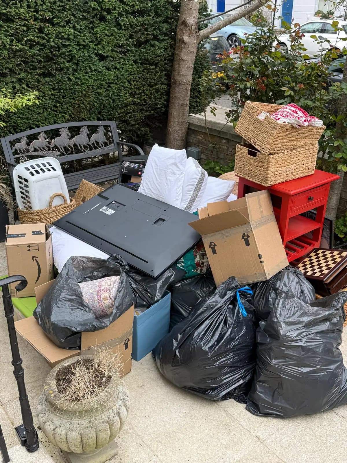 Before patio clearance waste removal — cluttered space