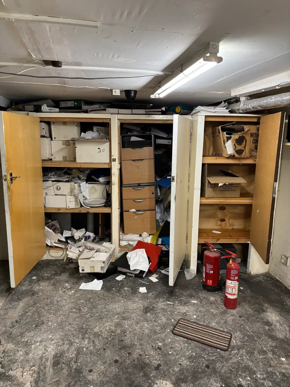 Before storage clearance waste removal — cluttered space